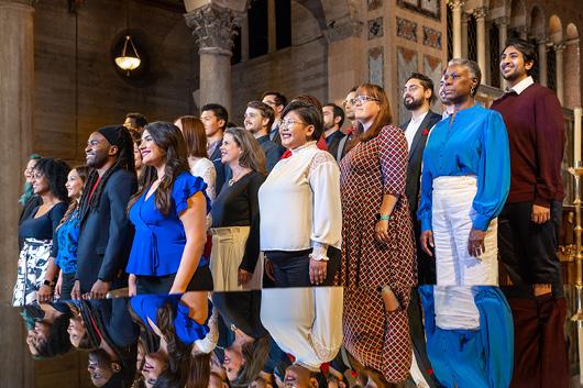 Group of people in church in daily clothing